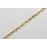 A 9ct gold fringe necklace with bolt ring clasp, 12g