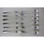 A set of six George V silver Old English pattern dessert spoons and six dessert forks, maker David