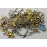 A collection of silver and silver gilt jewellery comprising necklaces, pendants, bracelets and