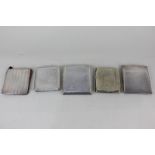 Four various silver cigarette cases and a card case