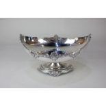 A George V silver pedestal bowl, makers Ollivant & Botsford, Birmingham 1929, with raised shell