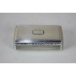 A William IV silver snuff box, maker Nathaniel Mills, Birmingham 1835, with vacant cartouche and