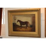 Follower of Albert Clark (late 19th / early 20th century), chestnut racehorse in a stable beside