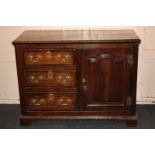 A George III oak sideboard with rectangular cross-banded top, three drawers and panelled cupboard,