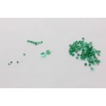 Four boxes of small faceted unmounted emeralds and four others