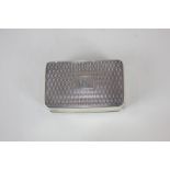 A William IV silver snuff box, rectangular engine turned top with engraved initials to centre,