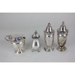 A mid-20th century silver three-piece cruet set of salt and mustard pots, baluster shaped, maker