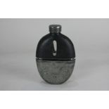 A glass hip flask with screw top leather mount and engraved silver plated beaker base, 14cm