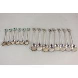 A set of eight George VI silver coffee spoons, the terminals cast as a standing dog, handles