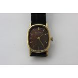 A 9ct gold Beuche Girod wristwatch, manual movement, bronzed dial, London 1973