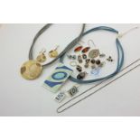 A 9ct gold and enamel pendant, two gilt necklaces, and various small items