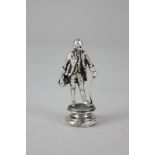 An Edward VII silver figural seal modelled as an 18th century gentleman, makers Nathan & Hayes,