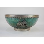 A Chinese green stone bowl, overlaid with white metal designs of a dragon and a hoho bird, with