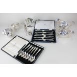 A cased set of six Mappin & Webb silver plated lobster forks, a cased set of six spoons, two sauce