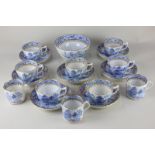 A 19th century blue and white porcelain part tea service, fluted shape with chinoiserie design and
