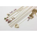 A collection of 9ct gold and silver gilt neck chains and pendants, three pairs of gem set ear studs,