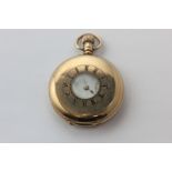 A 9ct gold half hunter pocket watch by Waltham, with subsidiary seconds dial, engraved initials to