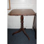 A mahogany rectangular tilt-top side table with fluted border, on turned baluster stem and tripod