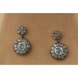 A pair of old cut diamond cluster drop earrings in silver on gold