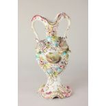 A Coalbrookdale style two-handled porcelain vase with encrusted floral decoration amongst two