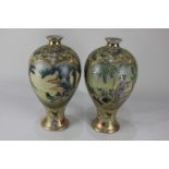 A pair of Japanese crackle ware globular vases decorated with figures, flowers, butterflies and