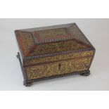 An early 19th century rosewood and foliate brass inlaid sarcophagus shaped work box with plaque