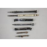 Two small propelling pencils (a/f), two silver propelling pencils, one by Sampson Mordan & Co, two