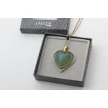 A Lalique crystal pendant carved as a heart, on a 9ct gold chain