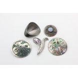 A Georg Jensen silver brooch numbered 928, three Mexican silver brooches, and an opal and silver
