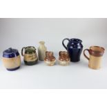 A collection of Doulton Lambeth and Royal Doulton tableware and a tobacco jar, to include a pair