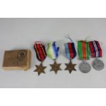 A set of five Second World War medals, the Burma Star, the Atlantic Star, 1939-45 Star, Defence