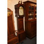 An early 19th century oak longcase clock with 11.5 inch painted arched dial and calendar aperture,
