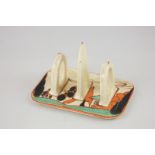 A Fantasque by Clarice Cliff 'Orange Trees and House' two-division toast rack, 13cm, (a/f)