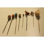 Eight various stick pins