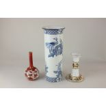 An HM & Co porcelain vase in blue and white oriental design, a Japanese Kutani bud vase, and a