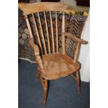 A pine farmhouse kitchen chair with slatted back, on turned legs