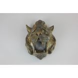 A 19th century gilt bronze wall plaque of a roaring lions head 15cm