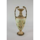 An early 20th century Bohemian porcelain baluster vase, marked Turn EW Vienna, decorated with floral