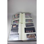 Approximately six hundred stock cards of British and World stamps, housed in two albums, including