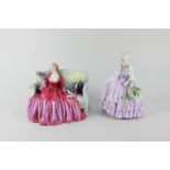 Two Royal Doulton porcelain figures, Sweet and Twenty HN1298, a woman in red dress seated on a sofa,