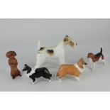 Five Beswick porcelain models of dogs, wire-haired terrier 'Talavera Romulus' (963), begging