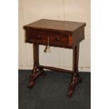 A Victorian rosewood side / card table with cross-banded rectangular fold-over swivel top, single