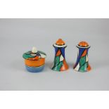 A Clarice Cliff for Newport Pottery three-piece Blue V design cruet comprising salt, pepper and