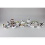 A collection of porcelain flower ornaments to include Royal Albert flower of the month series 'Sweet
