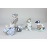 A Lladro model of a dog with a snail, 13cm, and a cat with a mouse, cm, together with a Nao model of