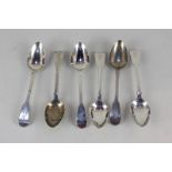 A set of six George III silver fiddle pattern teaspoons, terminals with engraved armorials, makers