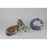 A Russian USSR Lomonosov porcelain model of a tiger, together with a Sargadelos modern sculpture