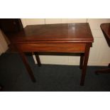 A 19th century mahogany rectangular folding card table (missing baize) on square chamfered legs