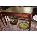 A Victorian style rectangular writing table, green leather inset top, two frieze drawers, on
