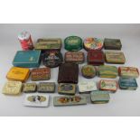 A collection of sweets, lozenges and tobacco tins, including Cadbury's commemorative 1910-1935 tin